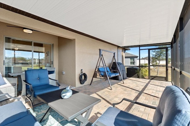 sunroom with plenty of natural light