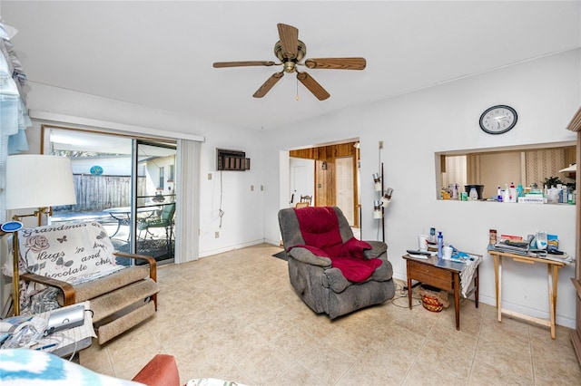 living room with ceiling fan