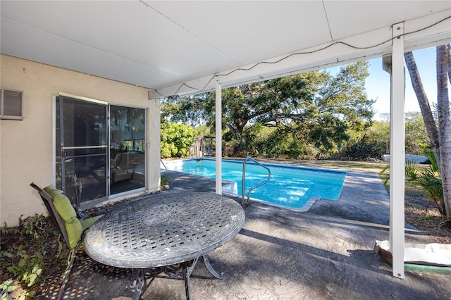 view of pool with a patio