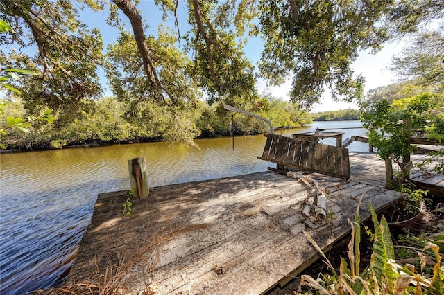 view of dock with a water view