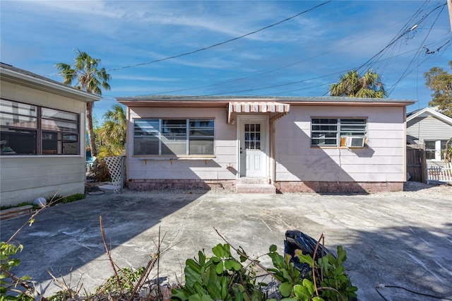 view of front of property with cooling unit