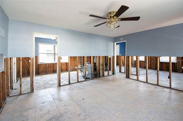 unfurnished room featuring ceiling fan