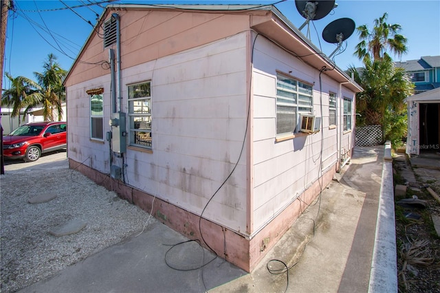 view of property exterior with cooling unit