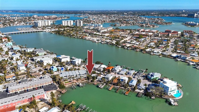 birds eye view of property featuring a water view