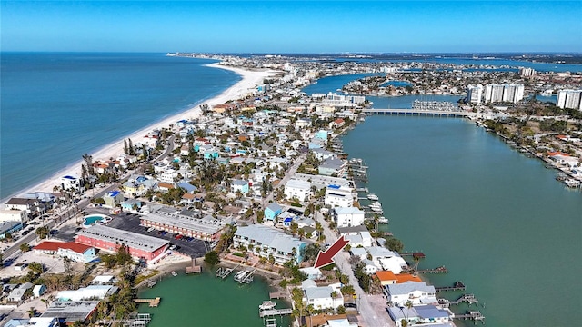 bird's eye view featuring a water view and a view of the beach