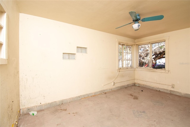 spare room with ceiling fan