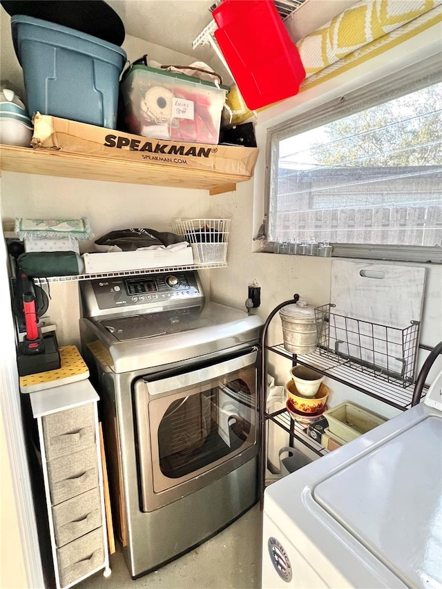 laundry area with washer and clothes dryer