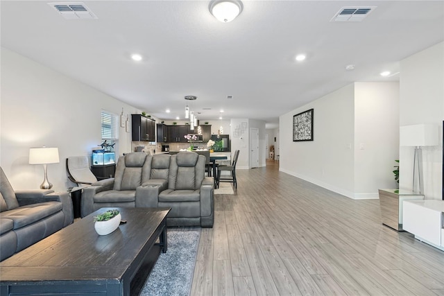 living room featuring light hardwood / wood-style flooring