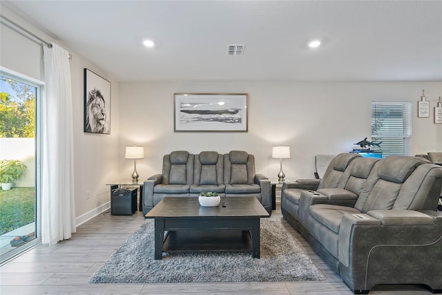 living room featuring light wood-type flooring