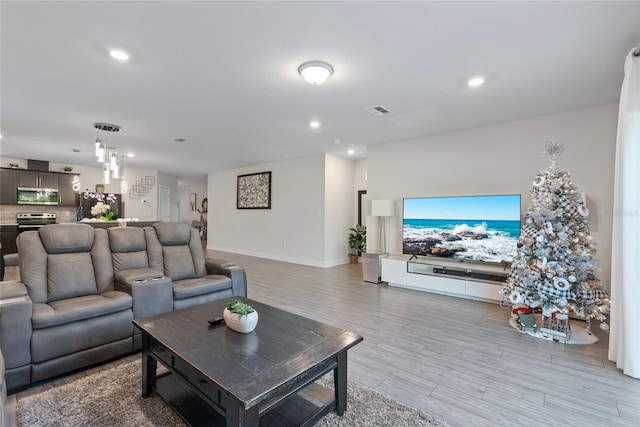 living room featuring light hardwood / wood-style flooring