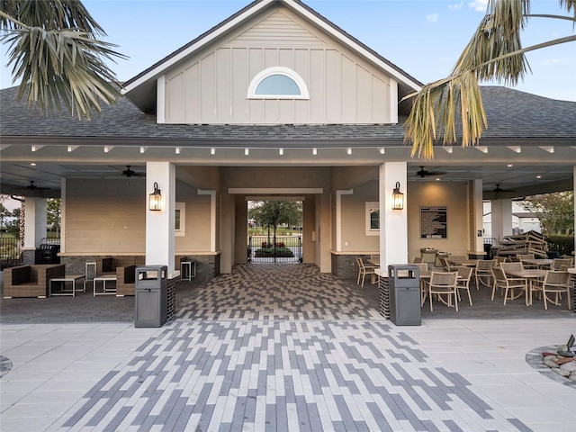 exterior space featuring ceiling fan and a patio