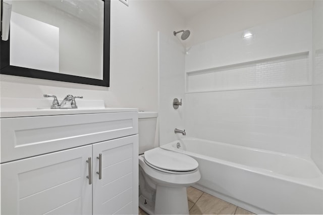 full bathroom featuring toilet, vanity, and washtub / shower combination