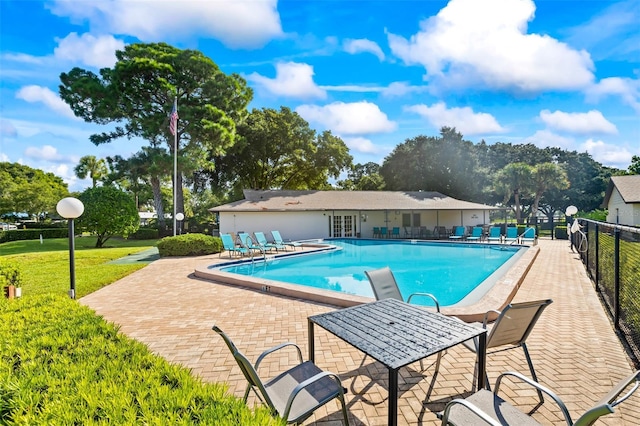 view of swimming pool featuring a patio