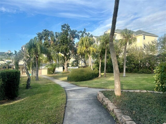 view of community with a residential view and a lawn