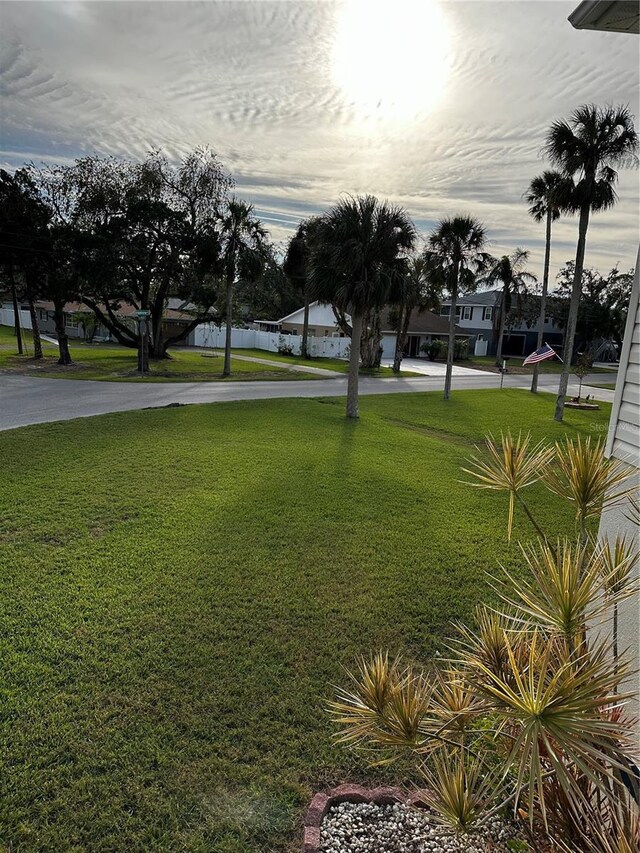 view of yard at dusk