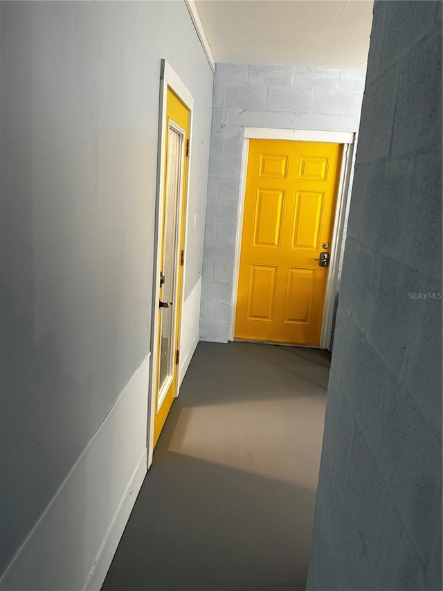 hallway featuring concrete floors