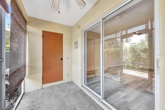 interior space with ceiling fan and a healthy amount of sunlight