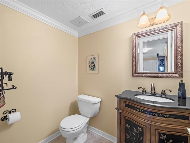 bathroom featuring tile patterned floors, vanity, a textured ceiling, crown molding, and toilet