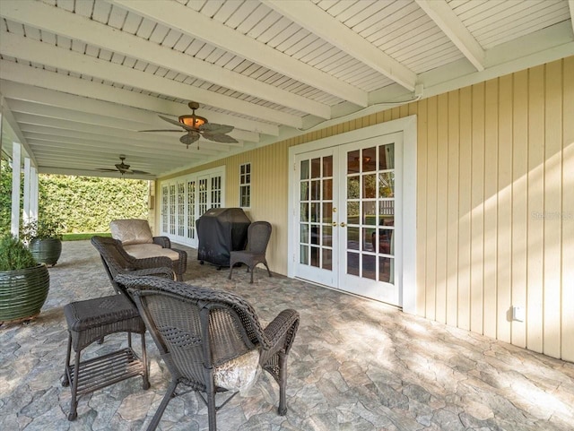 view of patio with ceiling fan, area for grilling, and french doors