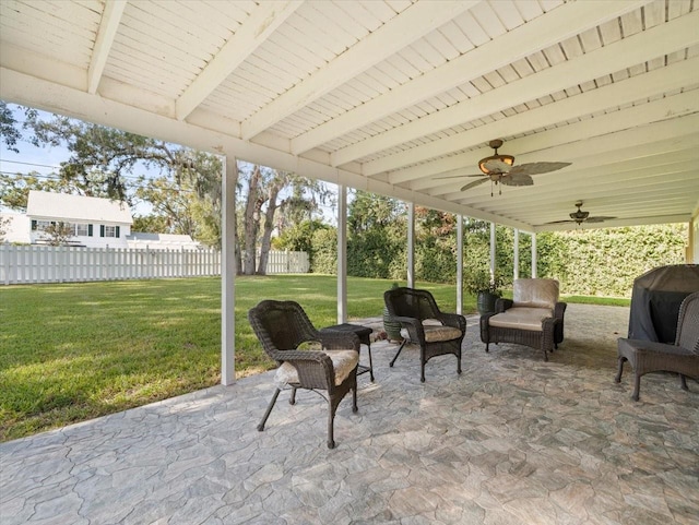 view of patio featuring area for grilling and ceiling fan