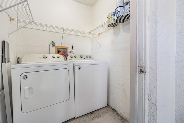 laundry room featuring washer and clothes dryer