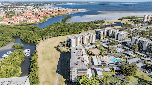 birds eye view of property featuring a water view