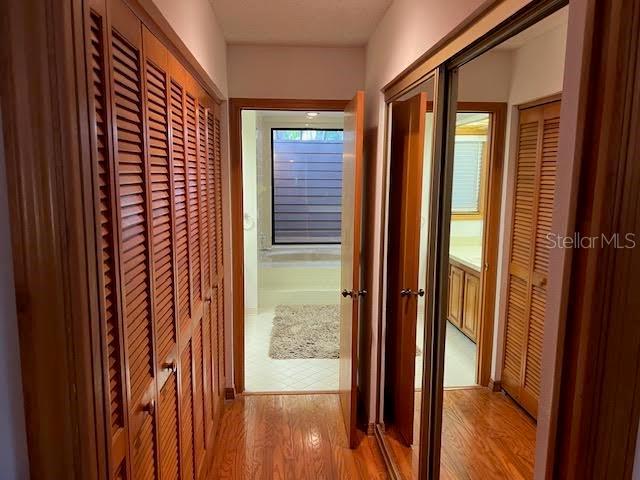 hallway featuring light hardwood / wood-style flooring