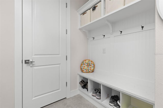 mudroom with light tile patterned flooring