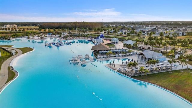 bird's eye view with a water view