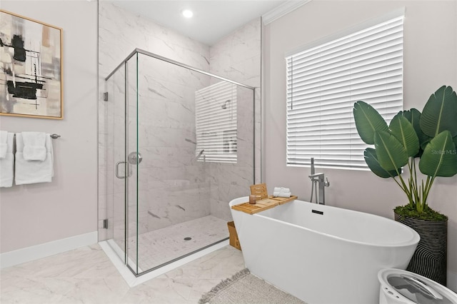 bathroom with shower with separate bathtub