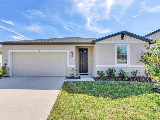 ranch-style home featuring a front yard and a garage