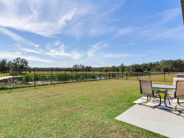 view of yard with a patio and a rural view