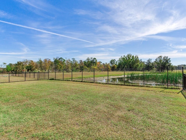 view of yard with a rural view