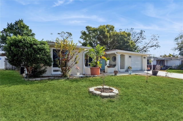 single story home featuring a front yard and a garage