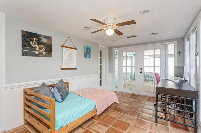 bedroom featuring ceiling fan, french doors, and access to outside