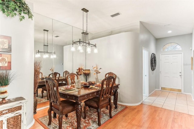 dining room with light hardwood / wood-style flooring