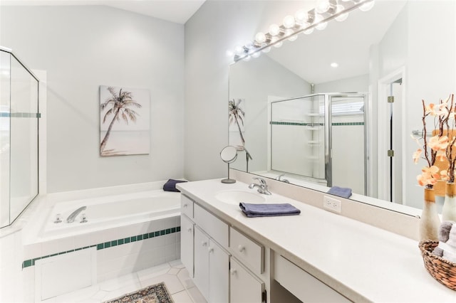 bathroom with tile patterned flooring, shower with separate bathtub, and vanity