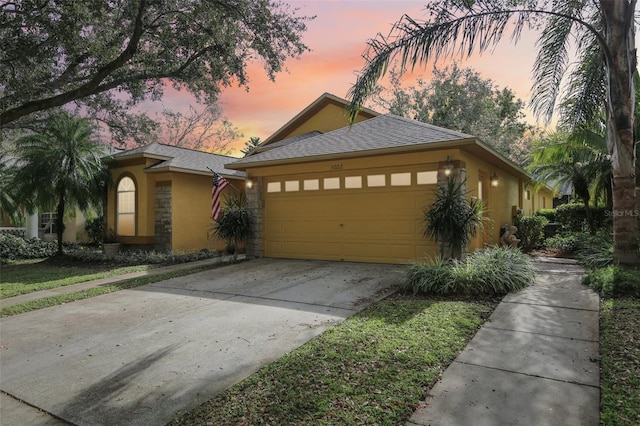 view of front of home featuring a garage