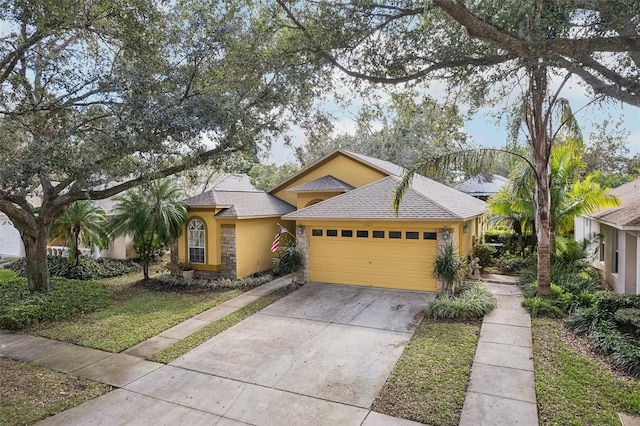 view of front of home featuring a garage