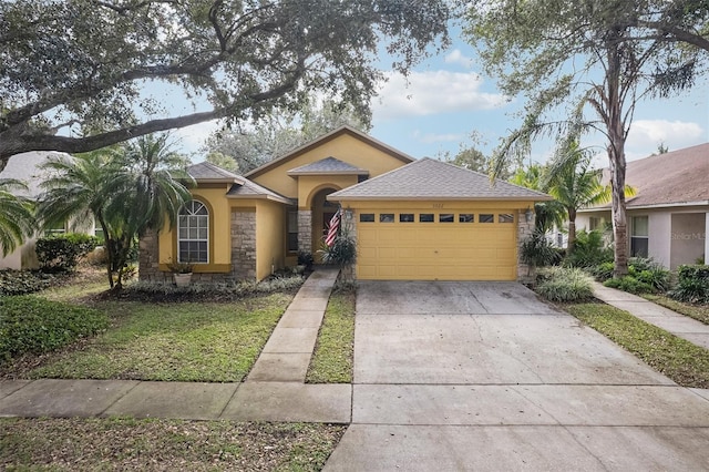 view of front of property featuring a garage