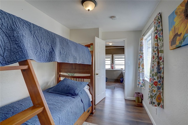 bedroom featuring dark wood-type flooring