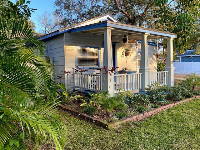 view of outdoor structure featuring covered porch