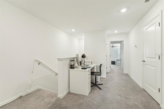 office area featuring light colored carpet