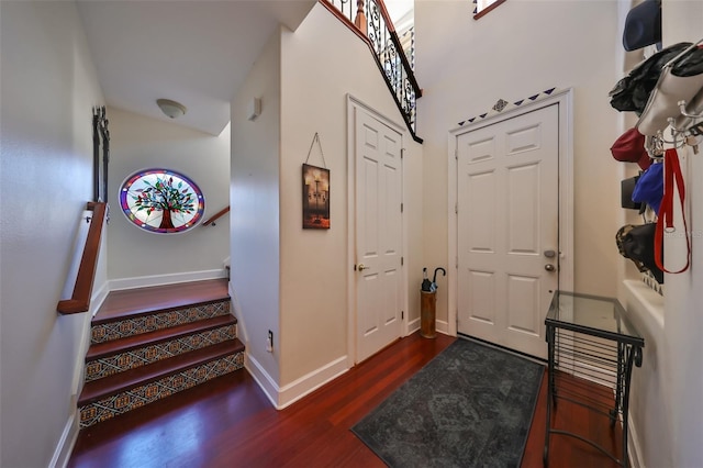 entryway featuring dark wood-type flooring