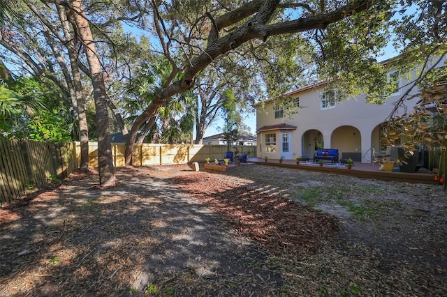 view of yard with a deck