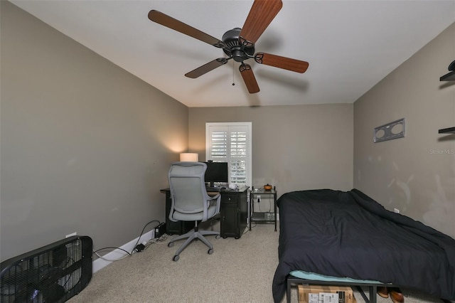 bedroom with ceiling fan and light colored carpet