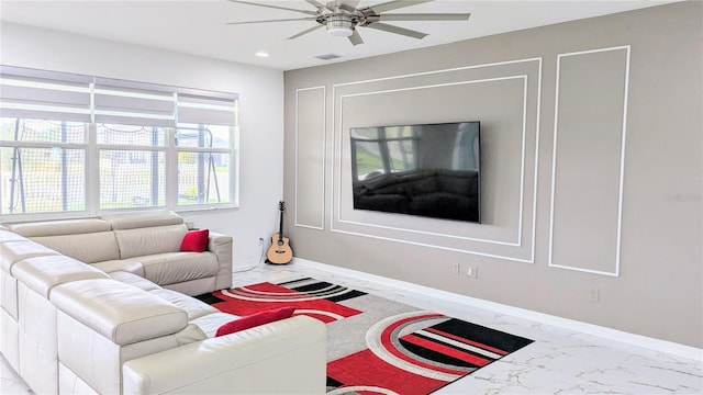 living room featuring ceiling fan