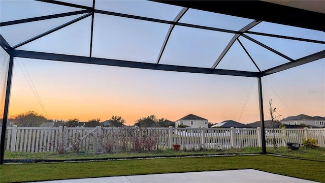 yard at dusk with a lanai