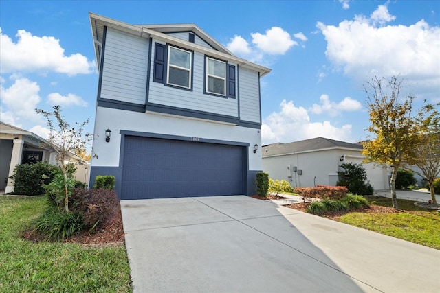 view of front property with a garage