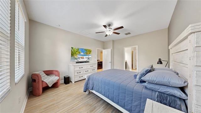 bedroom featuring ceiling fan and light hardwood / wood-style floors